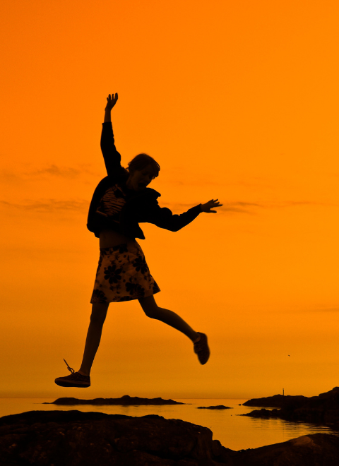 silhouette playing in sunset